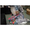 Image 3 : Bosch 12" compound miter saw CM10GD on Bosch TB4 gravity rise, folding stand, working at time of cat