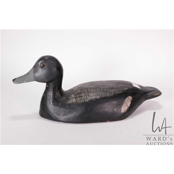 Vintage wooden duck decoy with 11" base, 5 3/4" height, tagged "Bluebill Drake" underneath