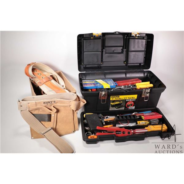 Stanley 19" tool box containing assorted hand tools, a new Kuny's tool belt and a safety harness and