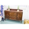 Image 1 : Antique flame mahogany sideboard with low back board, double doors and three drawers on cabriole sup