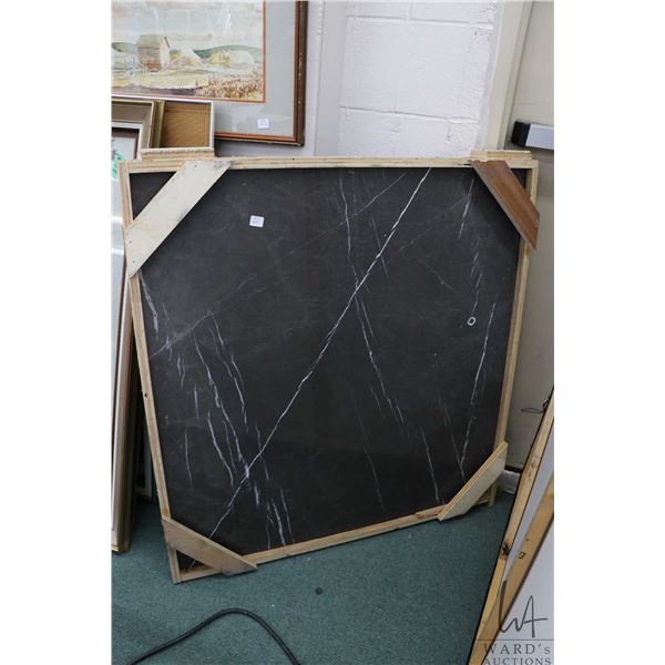 Piece of white veined black marble 35" square