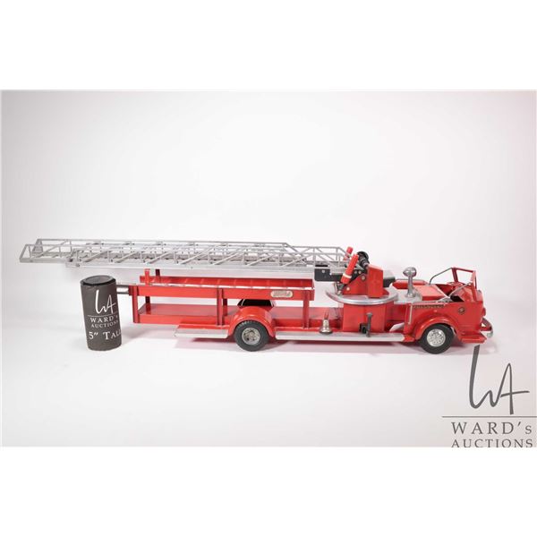 Vintage stamped tin ladder truck marked "The Charles W.M. Doepke Mfg. Co., Rossmoyne Model Toys" wit