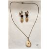 Image 1 : Ivory Pendant And Earrings With Gold Nuggets