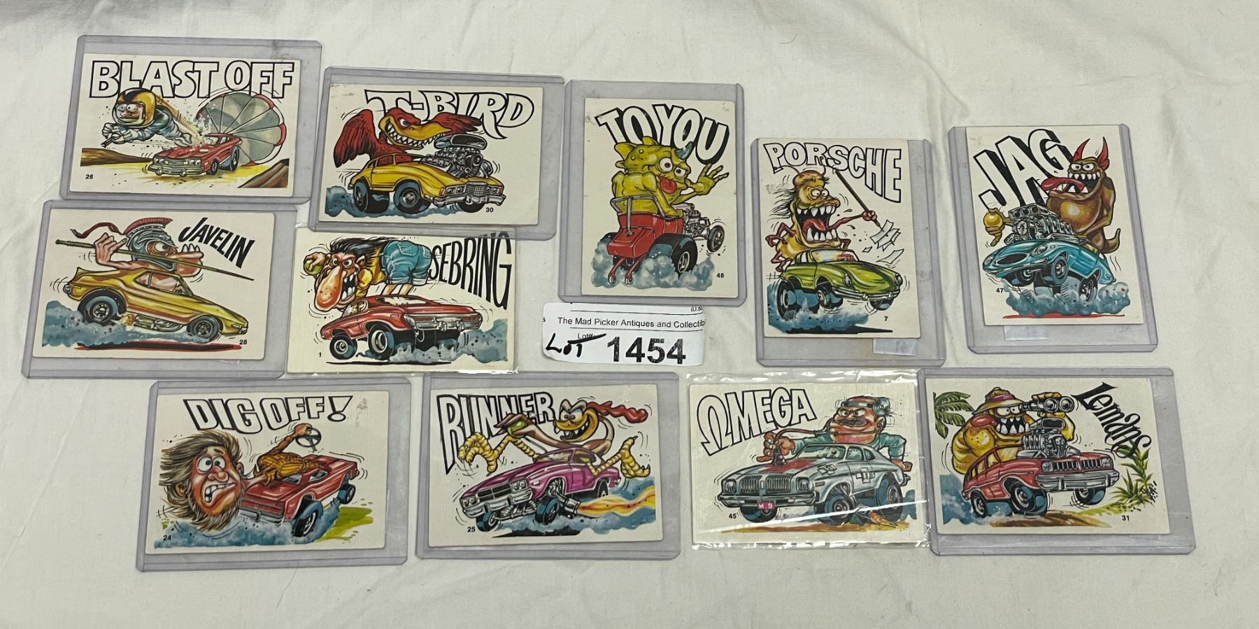 Stack Of Vintage Ed Roth Stickers In Top Loaders