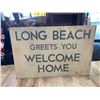 Image 1 : Vintage Plywood Long Beach Greets You Welcome Home Sign