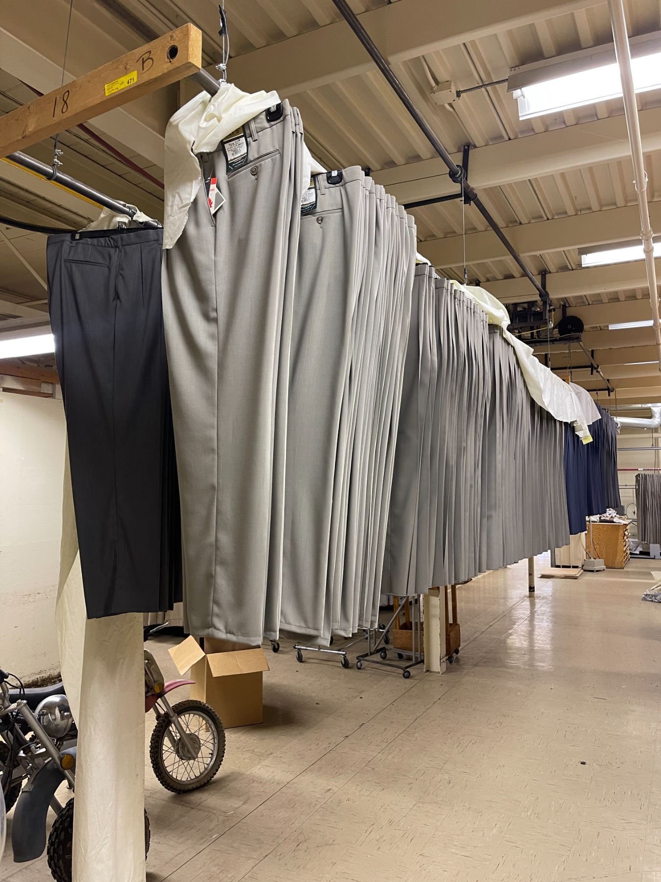 Clothing lot - All New Old Stock Clothing Hanging on Rack Including ...