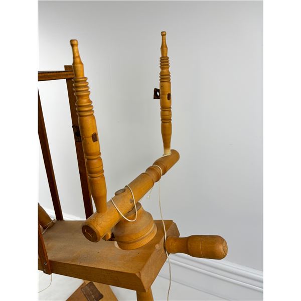 Wooden spinning wheel