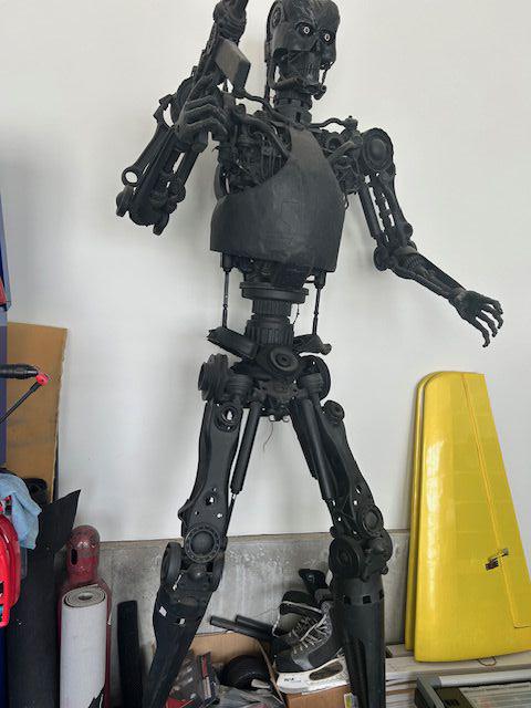 Terminator Part Human Part Machine OVER 6' METAL TERMINATOR STATUE MADE FROM AUTO PARTS, EYES LIGHT UP ...