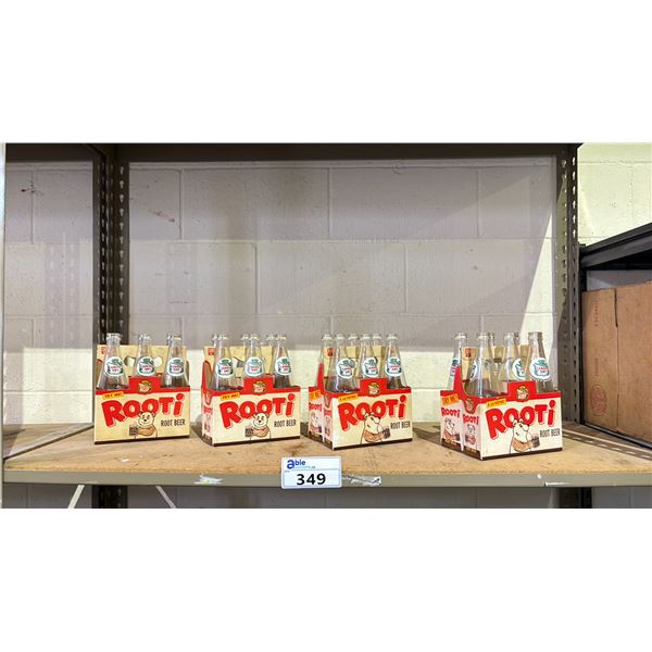 SHELF OF VINTAGE CANADA DRY ROOTI ROOT BEER BOTTLES WITH CARRIERS
