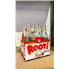 Image 2 : SHELF OF VINTAGE CANADA DRY ROOTI ROOT BEER BOTTLES WITH CARRIERS