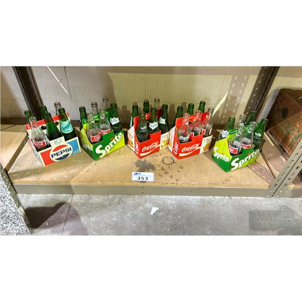 SHELF OF ASSORTED VINTAGE SODA BOTTLES WITH CARRIERS INCLUDING; SPRITE, COCA-COLA & FRESCA