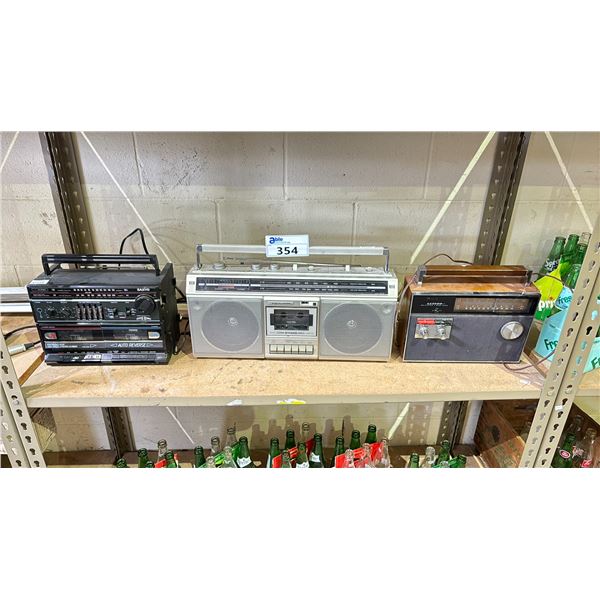 SHELF OF ASSORTED VINTAGE RADIOS INCLUDING; SANYO MW228, REALISTIC SCR-10 & LLOYD'S SOLID STATE 4
