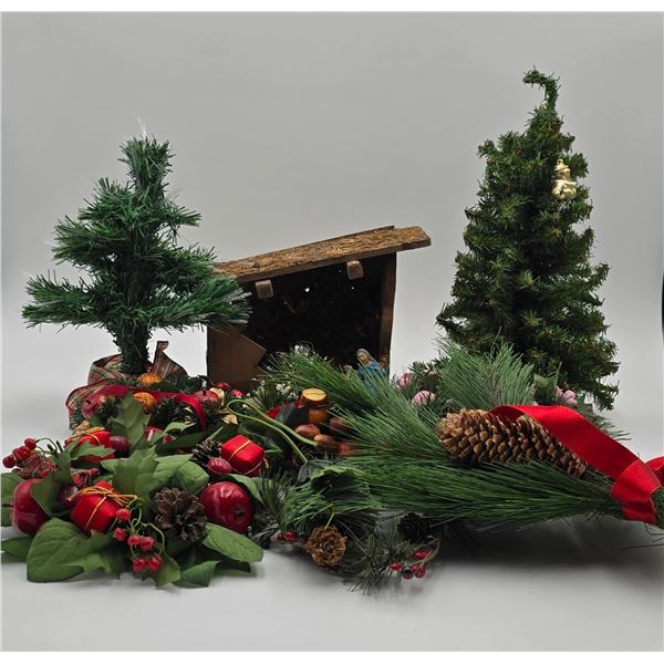 Christmas greenery décor with nativity scene