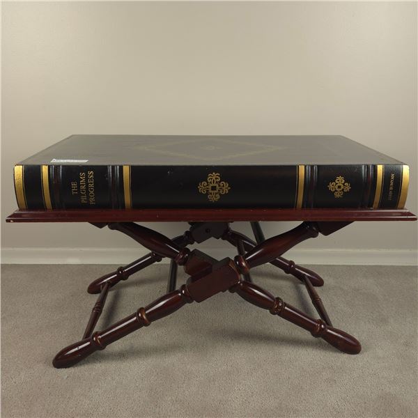 Decorative coffee table in the shape of a book