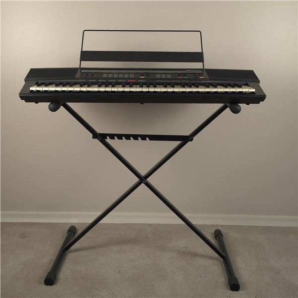 Yamaha keyboard with stand