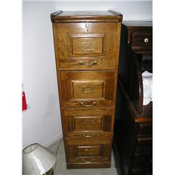 Oak 4 drawer file cabinet w/key