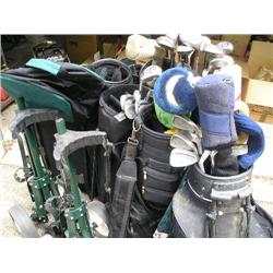 Large lot of golf clubs, bags.