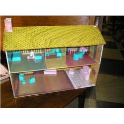 Old metal doll house w/some furniture