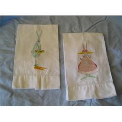Two stitched bunny hand towels