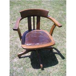 Solid oak swivel chair w/leather seat