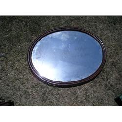 Wood framed oval mirror