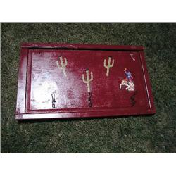 Coat rack w/cowboy designs