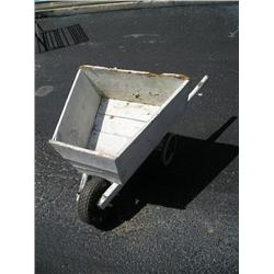 White primitive wheel barrow