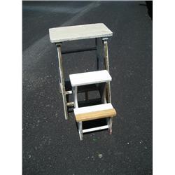 White stool w/fold out steps