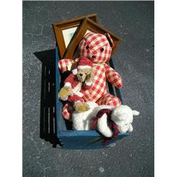 Teddy bear in doll bed