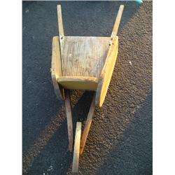 small primitive wheel barrow