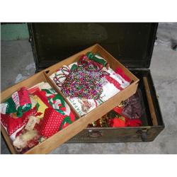 old world war ll trunk filled w/Christmas décor'