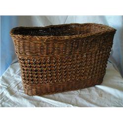Old woven magazine basket