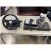 Image 1 : PANASONIC DVD PLAYER, NASCAR GAMING WHEEL AND FOOT PEDALS, AND PROJECTOR ALARM CLOCK