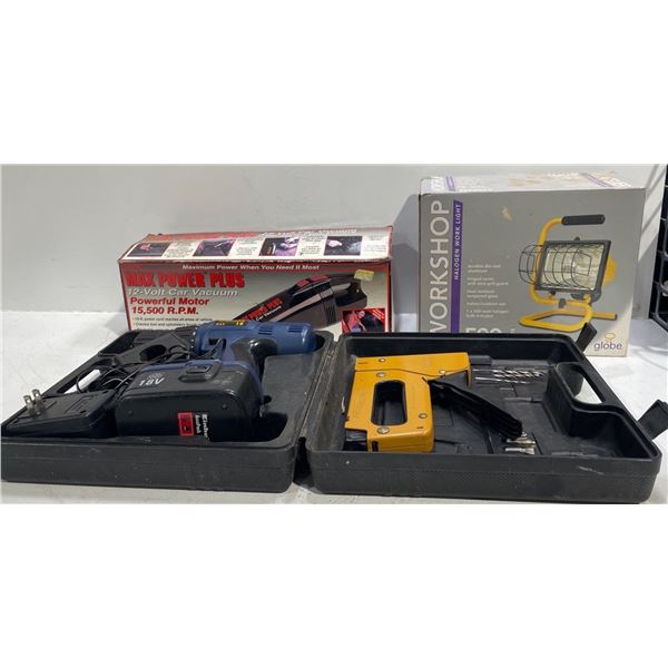 Collection of tools (staple gun, vacuum, drill and work light)