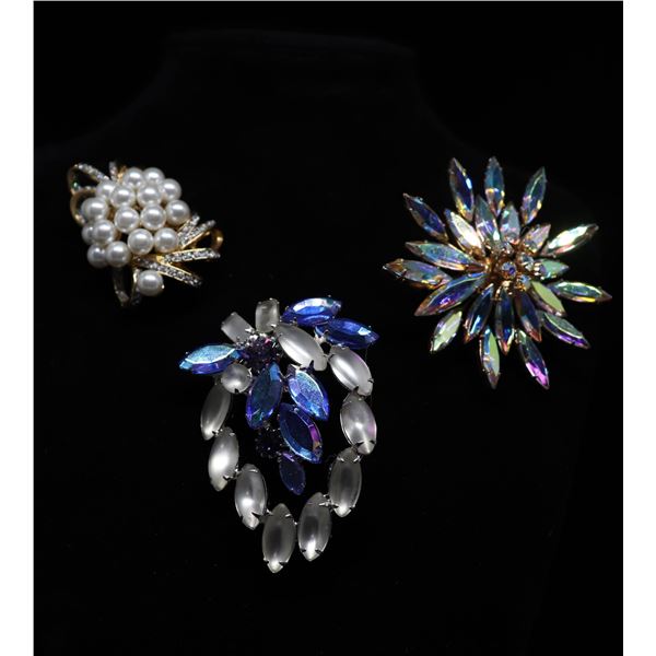 Three Brooches