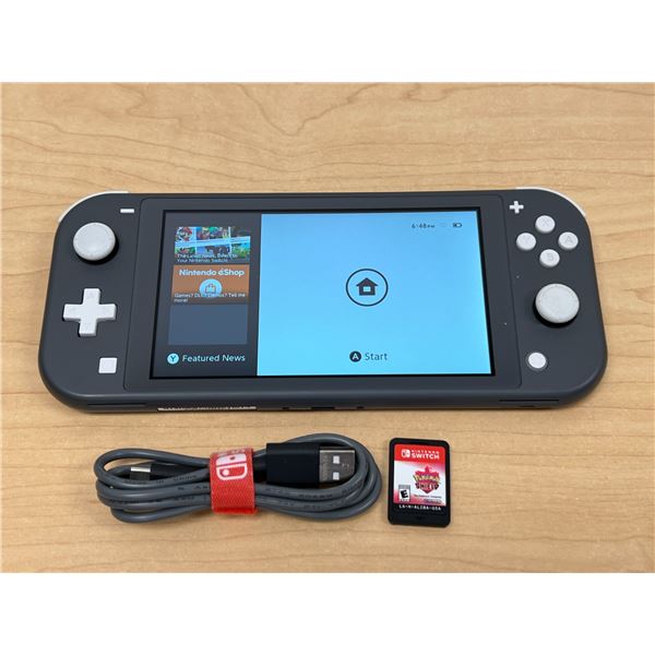 Nintendo Switch with Pokémon Shield & Cord - unit powers up, not tested further, see photos