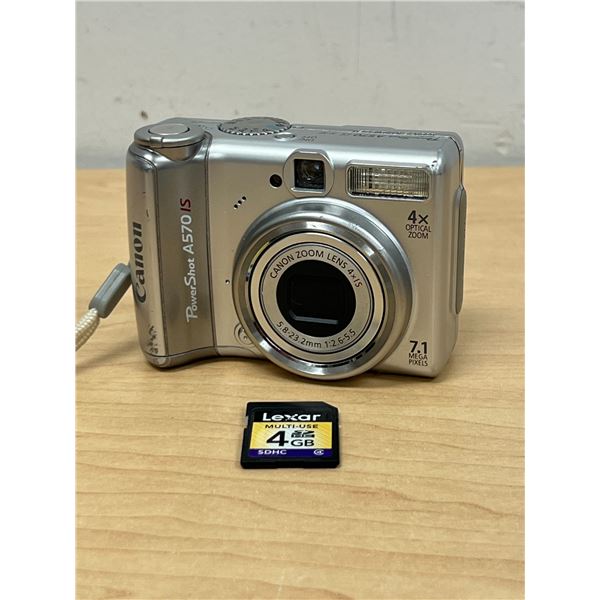 Canon Power Shot A570IS Digital Camera 7.1 Megapixel 4X Optical & Accessories, powers up