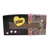Image 2 : 703. Tai's (Brittany Murphy) Elton Memory Box ### CLUELESS (1995)