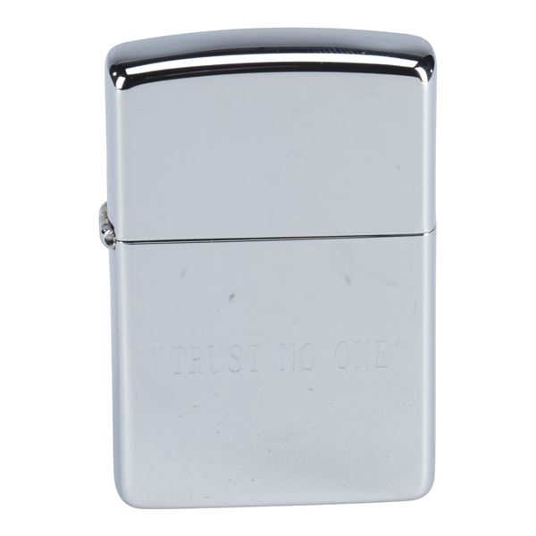 1911. Cigarette Smoking Man's (William B. Davis) Production-Made "Trust No One" Lighter ### THE X-FI