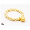 Image 1 : #20-SEA SHELL PEARL BRACELET 10-16 MM