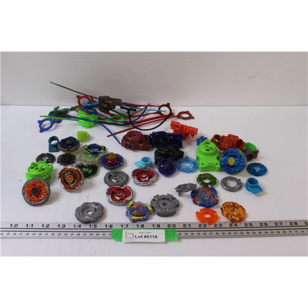 Beyblades (6) Rippers (12) Cords (6) Beyblades With Some Parts Missing