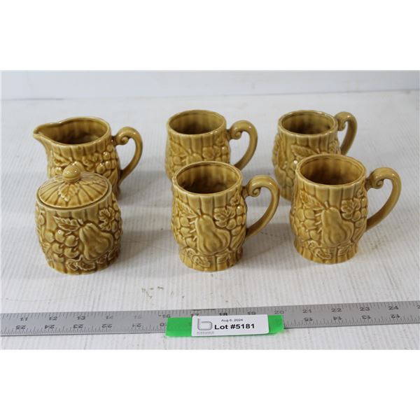 (4) Pottery Cups and Cream and Sugar Set