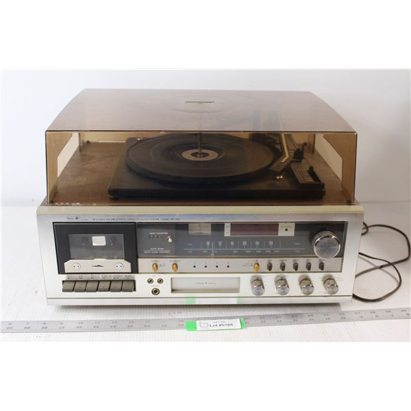 FM Stereo/FM/AM/8 Track/Cassette/Clock System Model RE-1300 Record Player