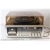 Image 1 : FM Stereo/FM/AM/8 Track/Cassette/Clock System Model RE-1300 Record Player