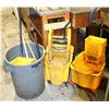 2 COMMERCIAL MOP BUCKETS W/ RINGERS & BRUTE