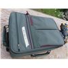Image 3 : suitcase with roller blade and reel