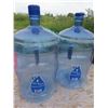 Image 1 : two 18.9 L water jugs