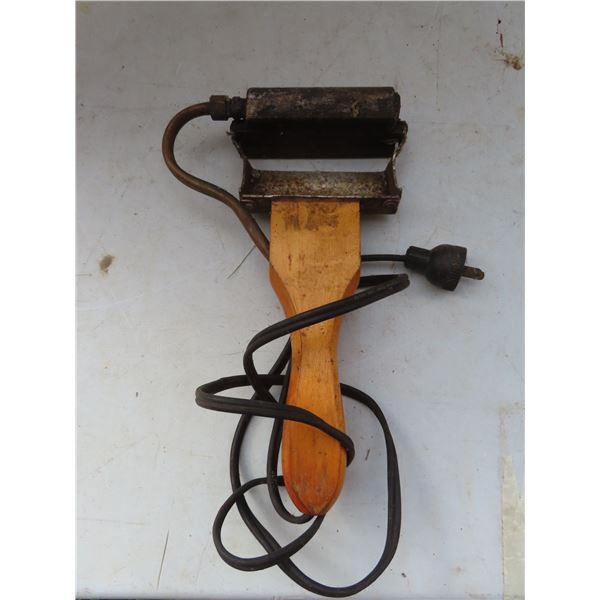 vintage electric uncapping knive