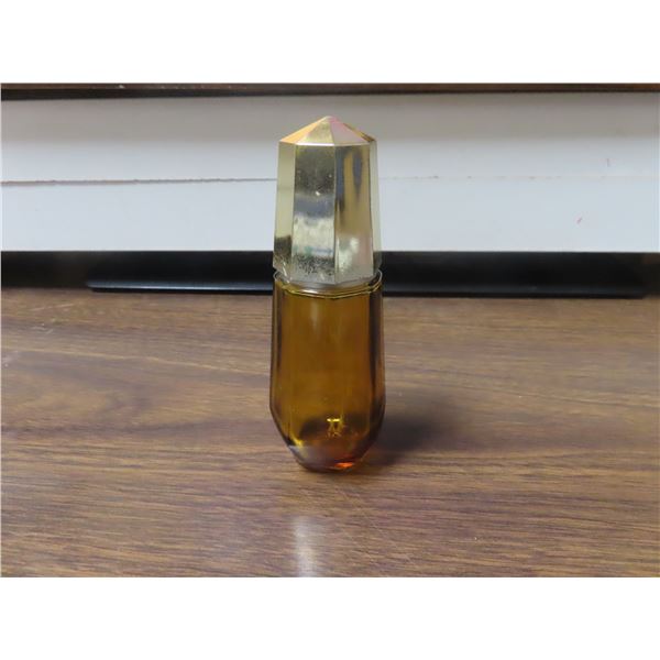 Avon amber glass perfume bottle with spray. Gold top.