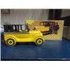 Image 1 : Avon 1926 Checker Cab. 5-ounce yellow painted over clear glass. Black plastic trunk cap & top. House